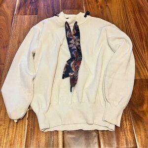 Women’s white sweater with paisley bow detail. Size large